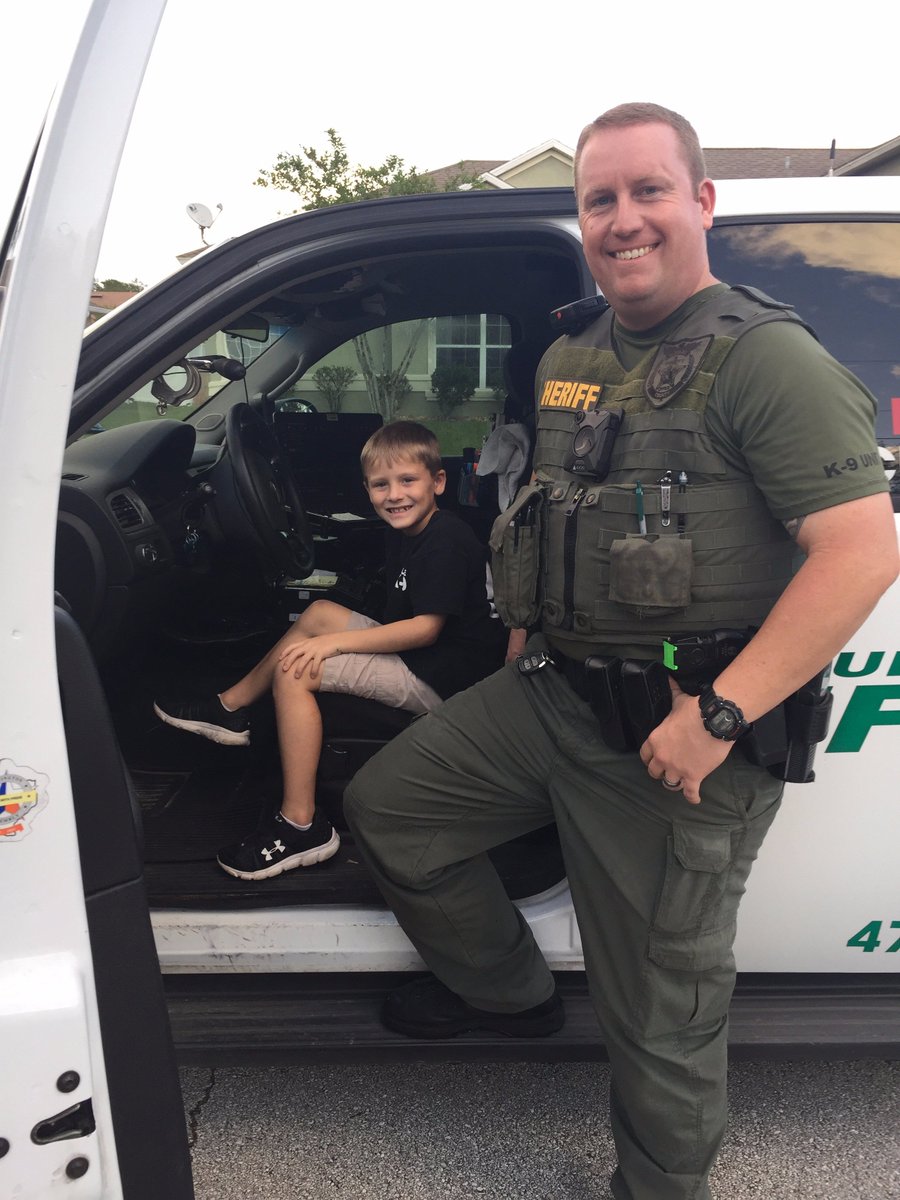 Chase is a huge LEO fan so Sgt Welker &amp; K-9 Jax stopped by to visit. Looks like we have another Junior Deputy in the making!