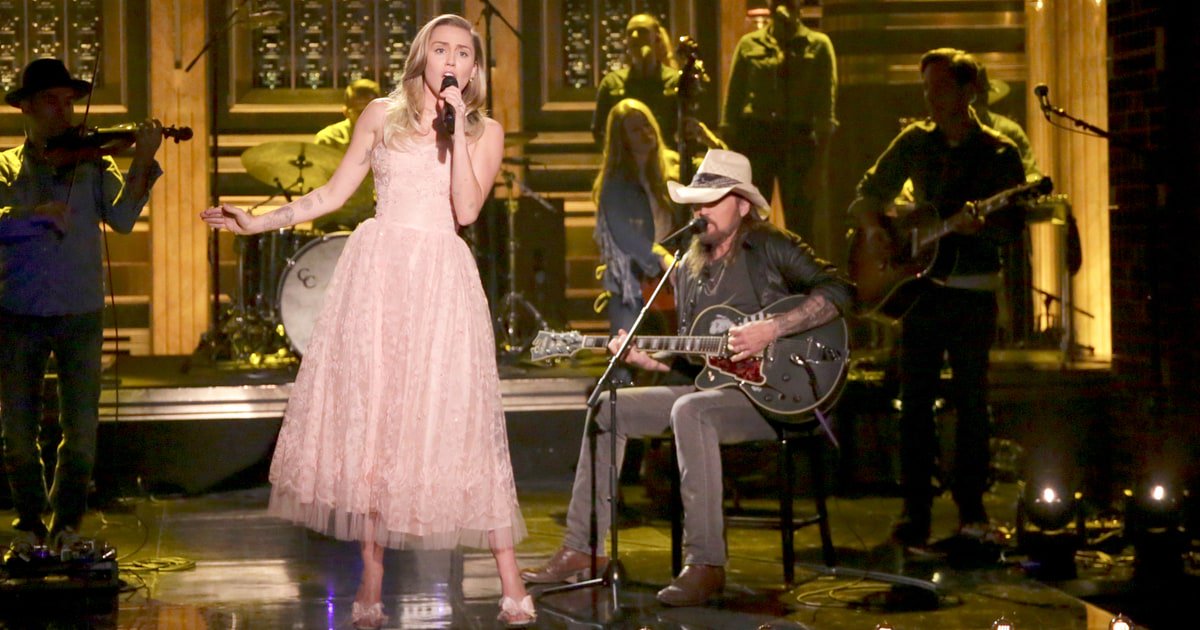 RollingStone's tweet photo. See Miley Cyrus and Billy Ray Cyrus' country-tinged cover Tom Petty's "Wildflowers" on #FallonTonight https://t.co/Mj89PmtaFQ https://t.co/ww343PD0NN