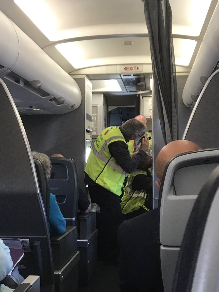 TheViewFrom3F's tweet photo. @AmericanAir Plane #1 broken. New gate, new plane. Now, 3 mechanics to fix flight attendant closet door. 2 hours delayed so far. Never ends https://t.co/KCkrJ2fCAo