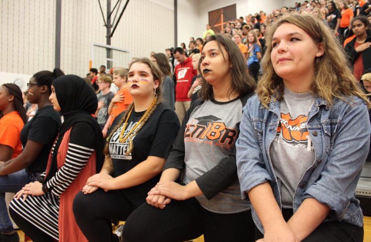 pjcommittee's tweet photo. #TakeAKnee at the NCHS homecoming assembly https://t.co/5D4v2urHdZ