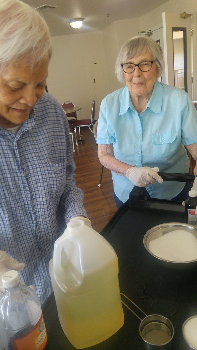 CallahanVillAD's tweet photo. Merle and Lois @Callahanvillage. Have the whole building smelling of popcorn as they make popcorn balls for movie night! #FrontierCulture https://t.co/I8ooBUU6X5