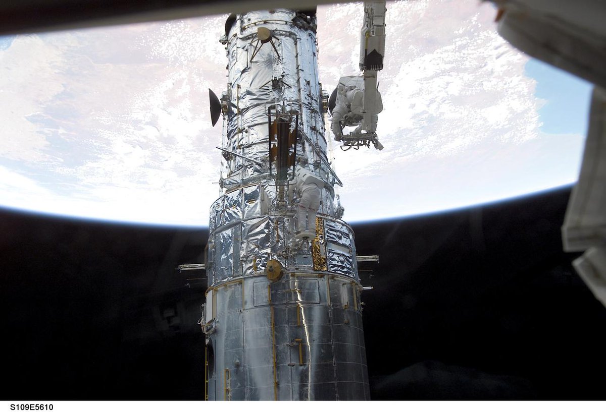 Astro_Mike's tweet photo. Happy birthday to my spacewalk buddy, Newman! #STS109 https://t.co/0NFyiz6oSe