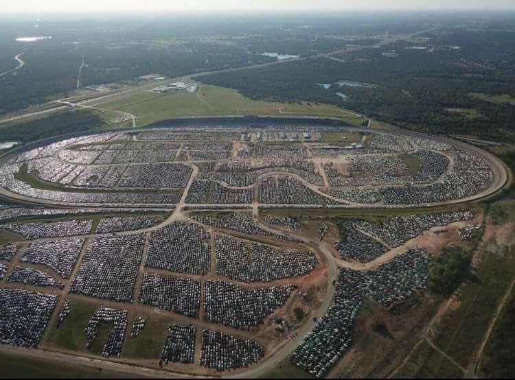 pbethancourt's tweet photo. Everything's bigger in TX including the number of cars flooded by Harvey at TX World Speedway near College Station. https://t.co/MgQeVNXiwi