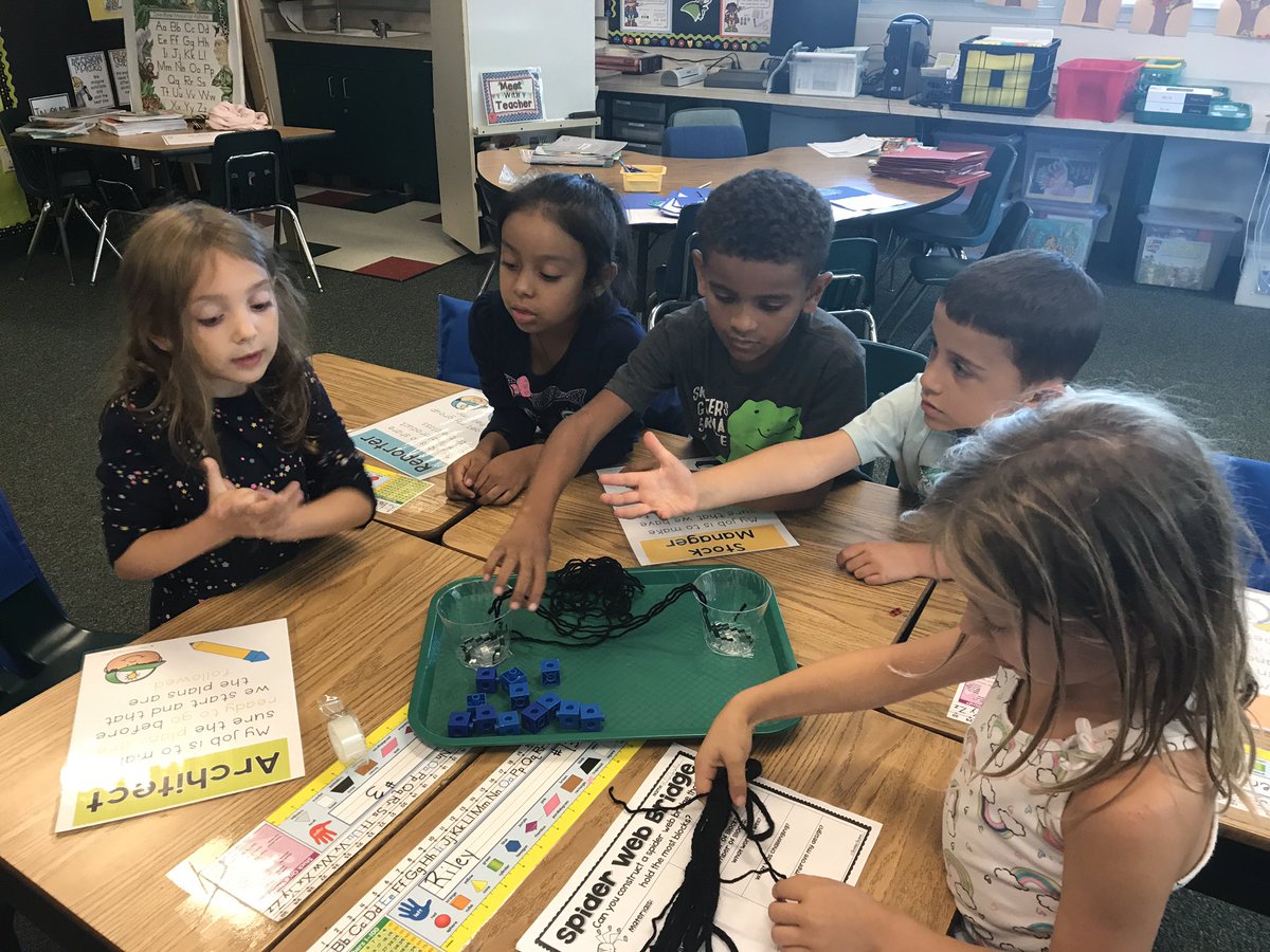 Firsties building bridges for spooky spiders to cross...loved seeing them use them STEM roles and responsibilities...and teamwork! #cusdlearns #Chelearns