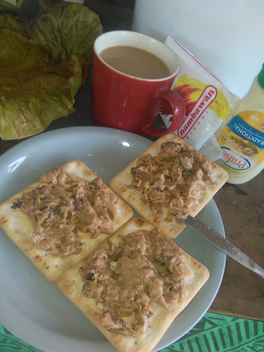 SEA URCHINS ON CRACKERS W/COFFEE

Breakfast this morn - sea urchins, a little mayonnaise on crackers &amp; coffee
