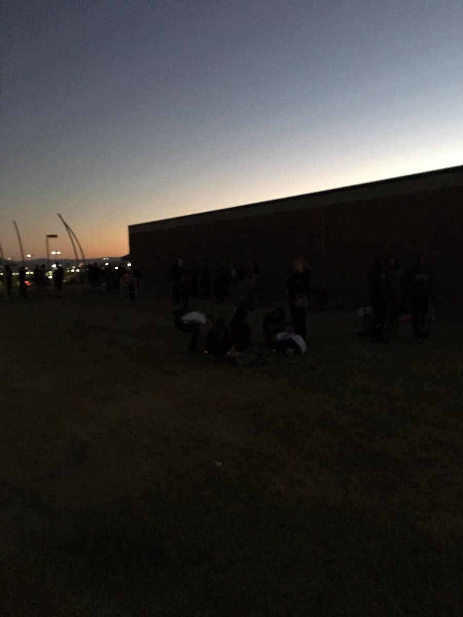 FLHSXC's tweet photo. The team is standing in front of the building at Foothill. Sorry you can't see them...sun isn't up yet. Welcome to XC https://t.co/IV7usuCdhL