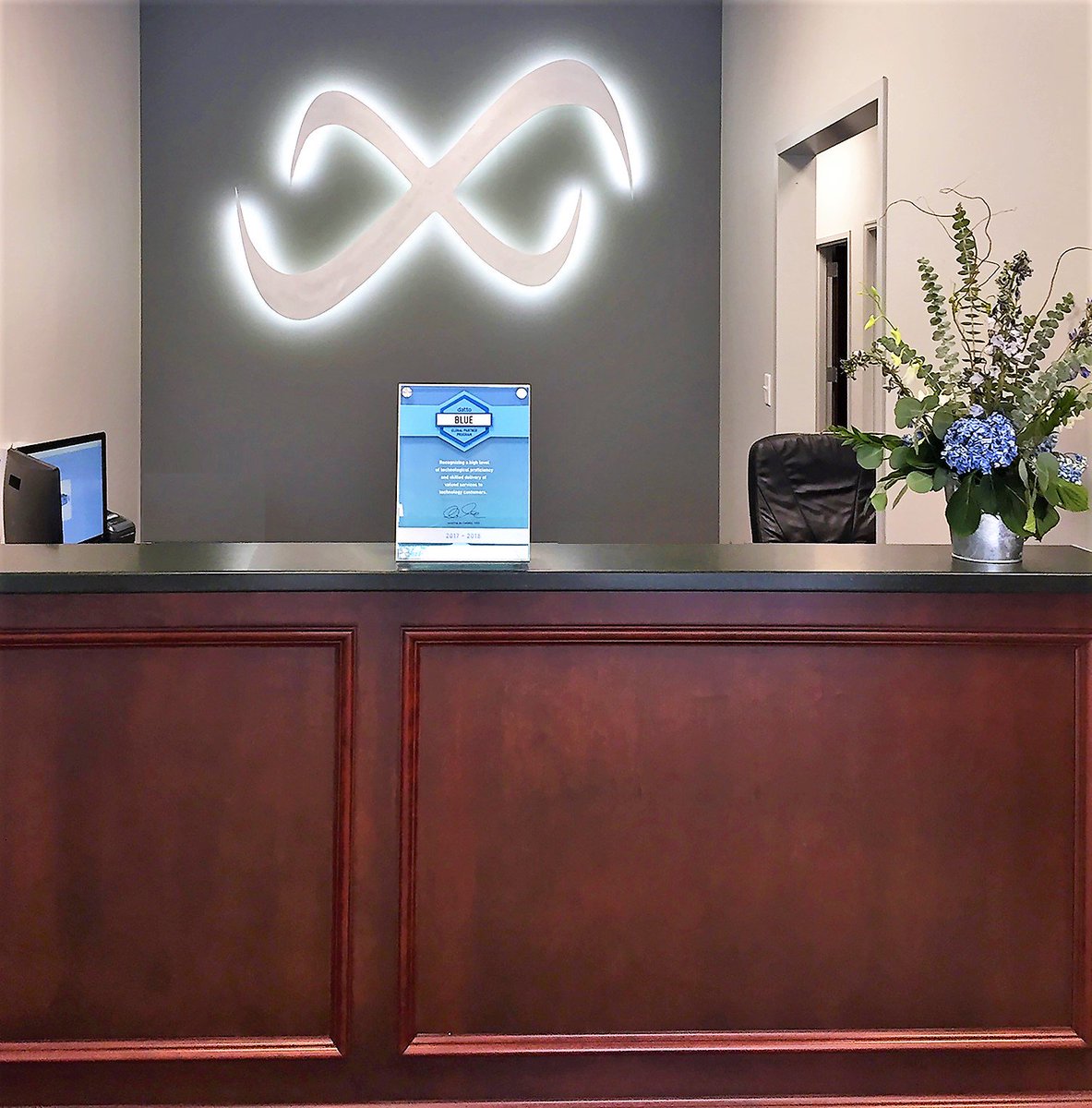 infinitysav's tweet photo. Thank you for the beautiful plaque @datto! We've got it front and center until we find a permanent home for it. #DattoBlue #wemakeITclick https://t.co/ZsZOIt6MYR