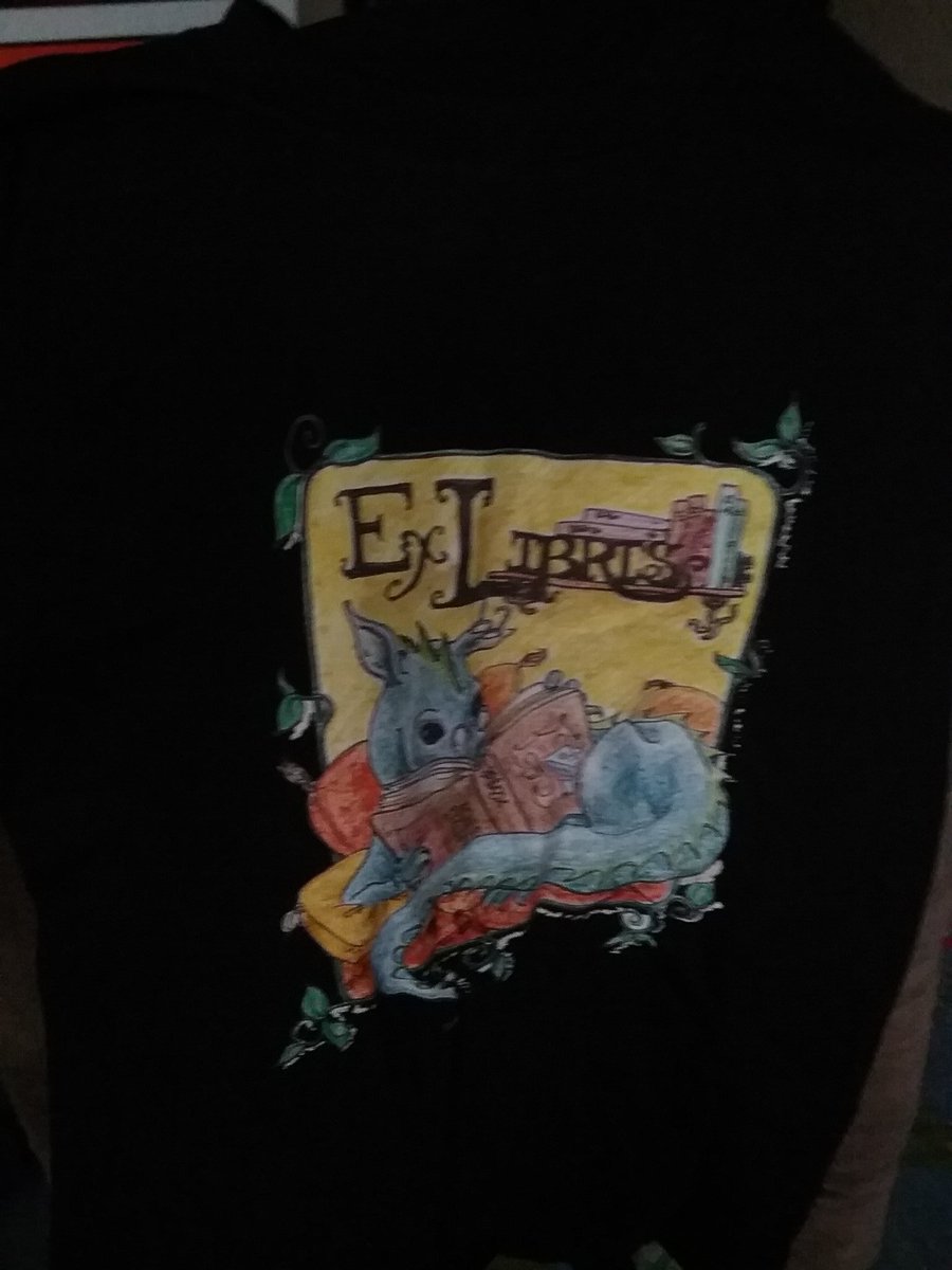 SKaiGottschalk's tweet photo. So there weren't any Riptide books, but I did snag this awesome shirt at the silent auction (probably bc i was the only smol) #MNLib17 https://t.co/XsAPiN4Xfe