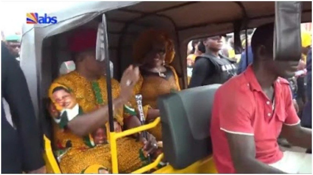 Hopeaudu1's tweet photo. Governor Willie Obiano and wife cruise around Anambra state in ‘keke napep’ (photos) https://t.co/TWAzKvOYqg https://t.co/P6BQzXCP2V