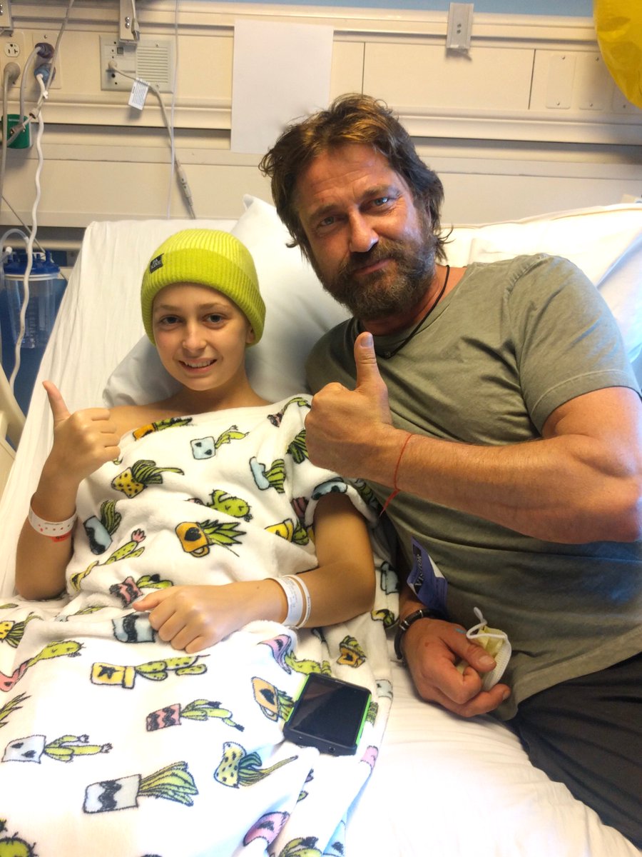 GerardButler's tweet photo. Jackson and Isaac. Superhero capes and thumbs up all around. These kids are unstoppable. Thanks for having me @LollipopTheater and @UCLAMCH! https://t.co/JqdIy1zjxv