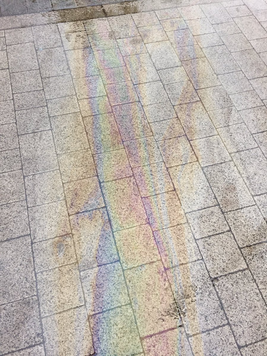 repeator123's tweet photo. Oil on stone, 2017, its raining (round the corner a fountain is singing). A spreading rainbow underfoot, #Repeator #CompositePlace #Coventry https://t.co/0P67zSO7mK