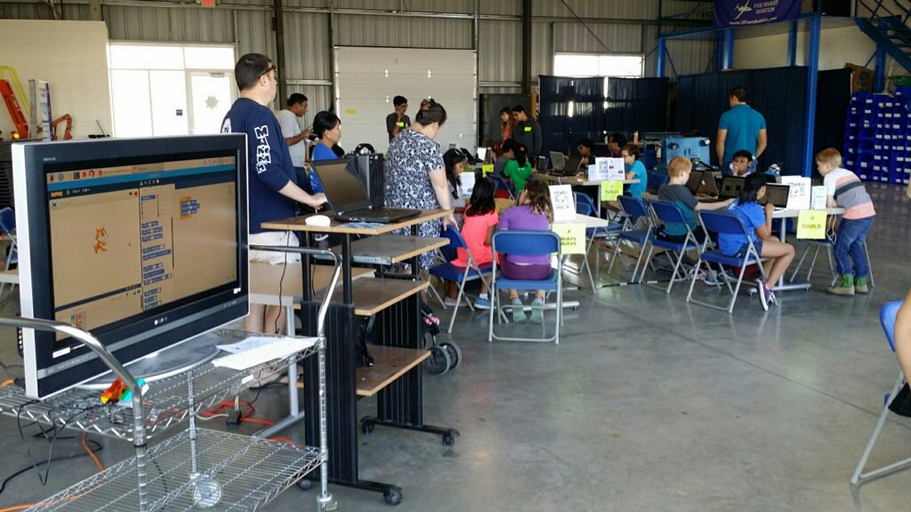 TriVCoderDojo's tweet photo. #TriVCD introducing more kids to the love of #Coding @ #livermoreairport. Thanks @fly5rivers @majesticnet for hanger space, IT, &amp; support! https://t.co/kRy0RIO4fj
