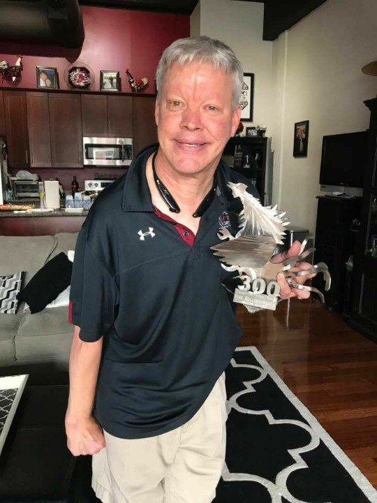 theUSC's tweet image. I want to thank Kyle & Holly Rogers for presenting me with 300th consecutive @GamecockFb game plaque/trophy to commemorate this special day!