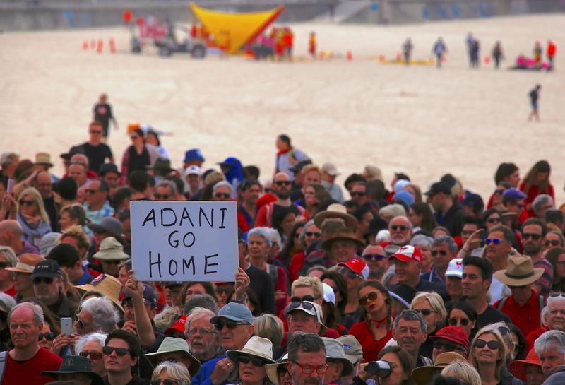 ReutersAsia's tweet photo. Thousands protest across Australia against giant Adani coal mine https://t.co/CLc8K98L8f https://t.co/jkq97YgnQH
