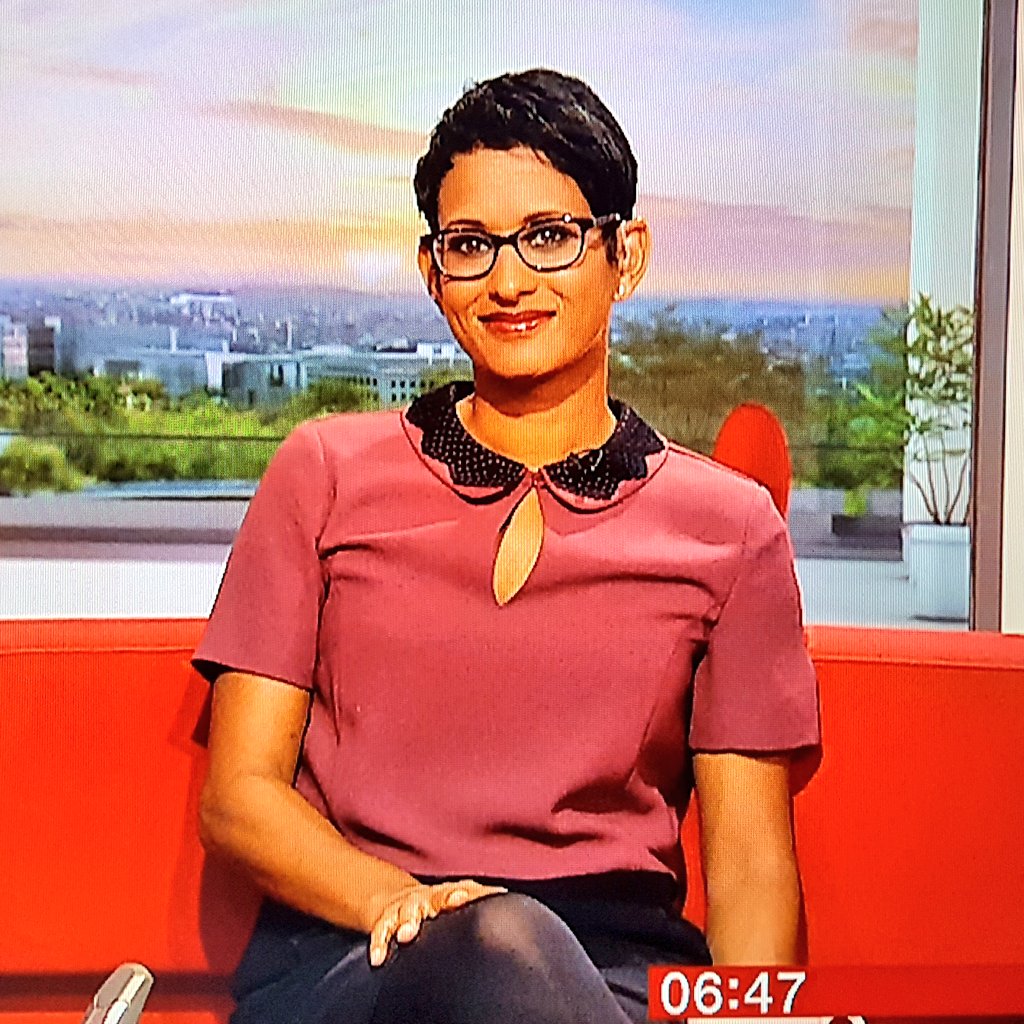 raymach1's tweet photo. Stylish Naga presenting Saturday's #bbcbreakfast #nagamunchetty #style #fashion #tvpresenter #smile #glasses #maroontop #legs #heels #tights https://t.co/bg1UtFWRf3