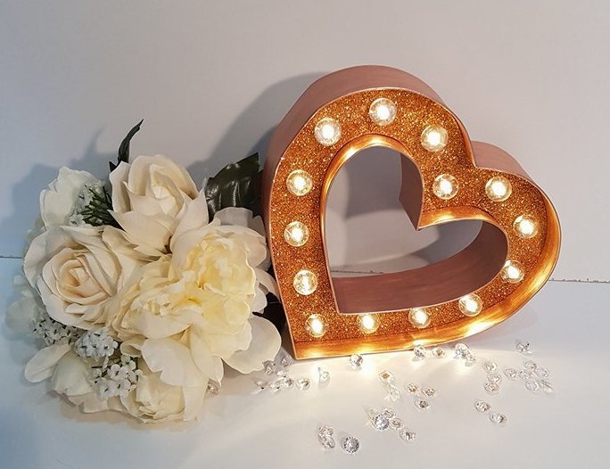Add a touch of glitter and sparkle to your wedding decorations with a mini light up heart from Lace &amp; Pearls. bit.ly/2y8Tfod