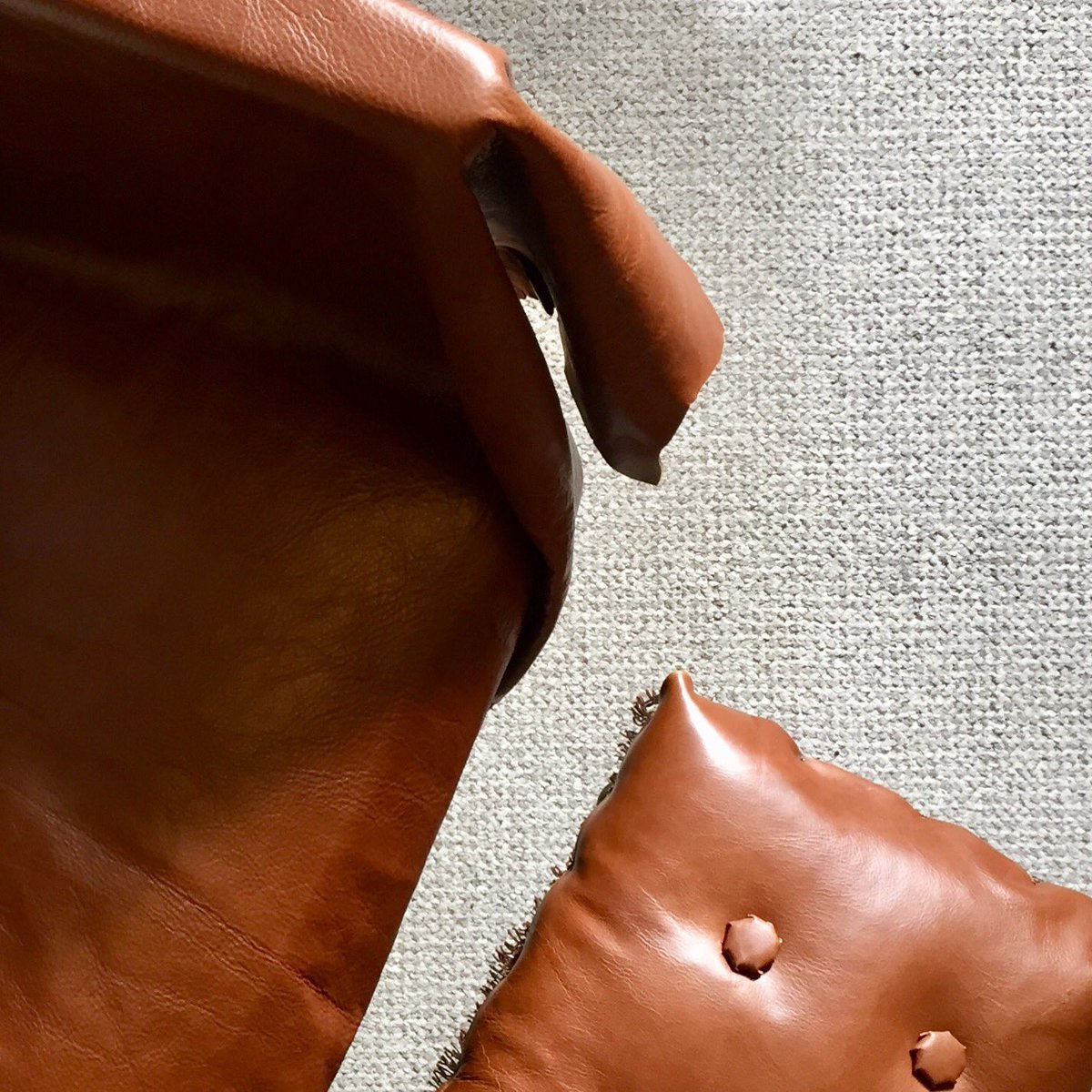 enseabe's tweet image. Weekend #upholstering (project two): first steps of an armchair and finished foot stool using unwanted damaged leather off-cuts.