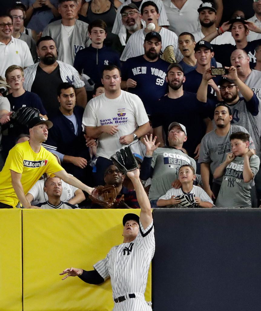 SportsCenter's tweet photo. All rise for Aaron Judge's first career home run robbery. [Credit: Frank Franklin II/AP Photo] https://t.co/zrdfTxk3wR