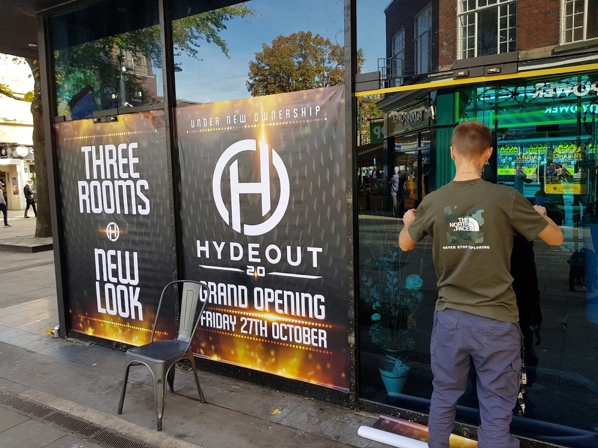 signfirm's tweet photo. New owners @Hydeout_Watford - just fitted some banner graphics over the glass as temporary signage whilst the refurb is taking place https://t.co/t5uVdh9eSr