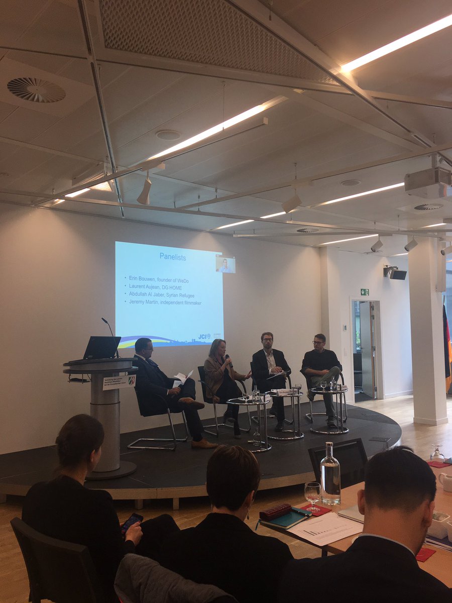 Panel debate kicked off with Syrian refugee Abdullaj on Skype, @erinbowen from WeDo, Laurent from EC and filmmaker Jeremy Martin #eukht2017