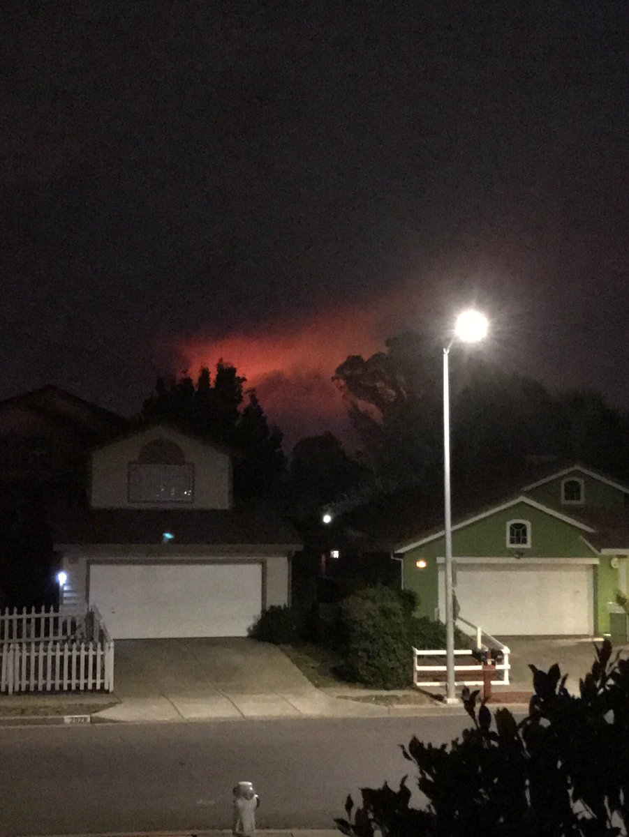 Juliodoesit's tweet photo. @SPaulsonKTVU my view from behind Target on Santa Rosa Ave. Taylor Mountain surrounded by same red glow https://t.co/QXSN7v7hqd