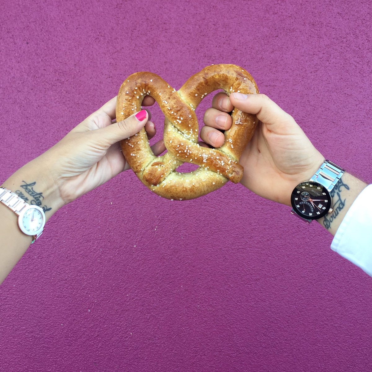 Enjoying a pretzel at the Santa Cruz Beach Boardwalk