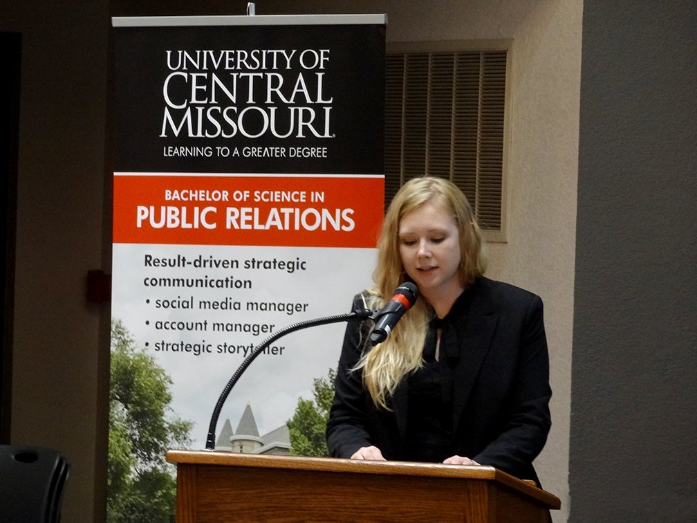 UCM_PR_Program's tweet photo. @UCM_PR_Program student and @UCMPRSSA president @rachellspears introduces this year's PR Pro Day speaker @vasquez007. #FuturePRPro https://t.co/uERkD1C8bG