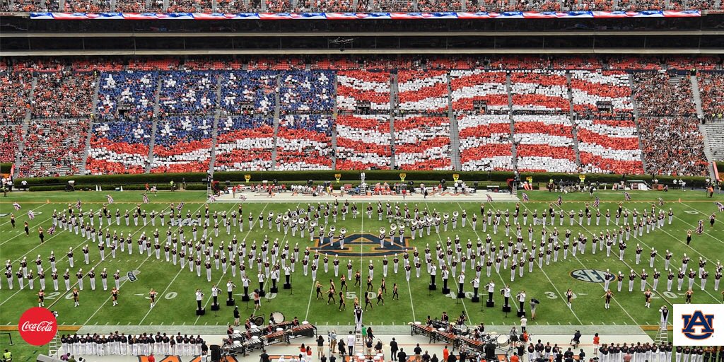 AuburnTigers's tweet photo. Thank you fans for helping us honor our Military with the flawless execution of this card stunt, courtesy of @CocaCola.

#WarEagle https://t.co/ofeVoXaL60