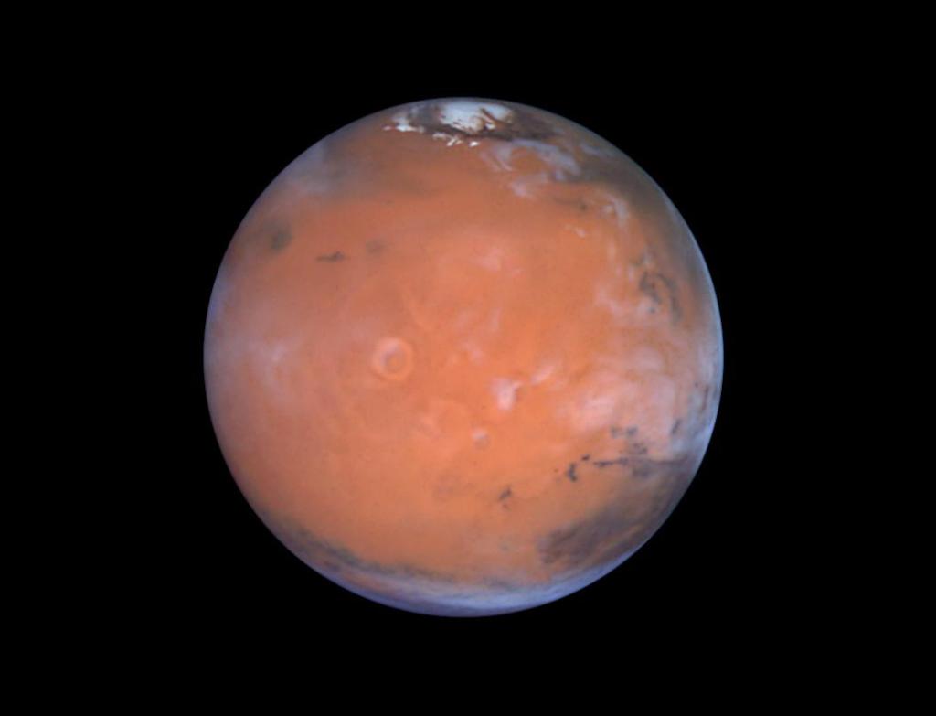 NASA's tweet photo. Evidence of ice where it shouldn’t exist was discovered using older data from our longest-operating Mars orbiter: https://t.co/dJQVC6TQcD https://t.co/XmSZMKtwtI