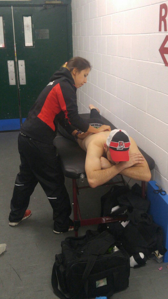 Sasha working on a hockey player's back after their game today at Westwood arena! #SportSideMedical