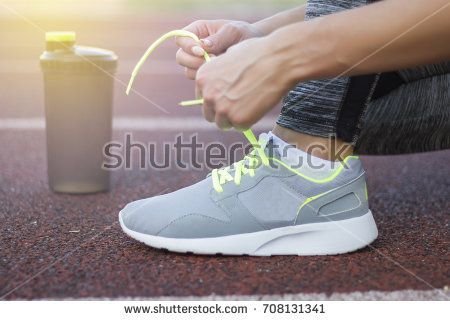 Female #runner #lacing her #sneakers on a #stadium #running #track
#shutterstock
Download Picture Here: buff.ly/2xctS0x