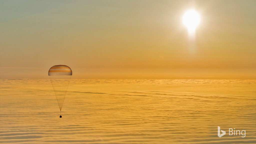 bing's tweet image. A Soyuz descent module gently returns to Earth. #SpaceWeek Bing.com