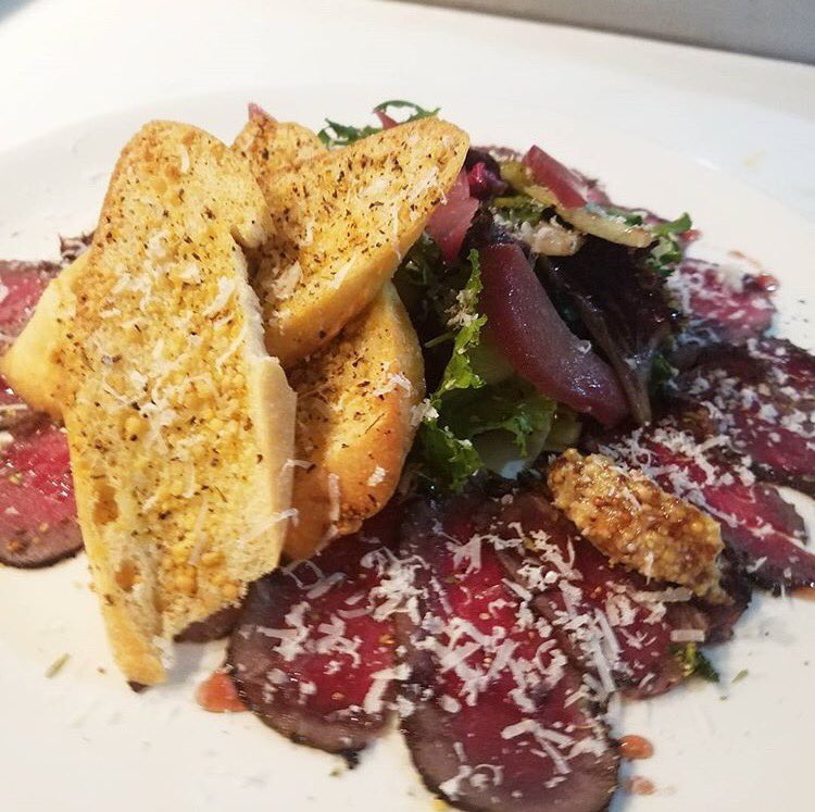 It's back! Leopold Whiskey Barrel Stave Smoked Trio of Carpaccio featuring Elk, Water Buffalo, and Kangaroo.