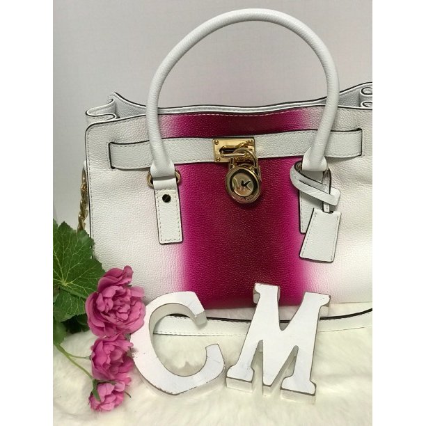 Think pink! Or just think about us 😉 We love Michael Kors, especially this beautiful ombré design. The best part...