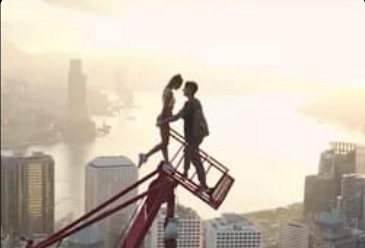 Aishgupta05's tweet photo. A #Russian couple Angela Nikolau &amp; Lvan Beerkus has climbed the highest #Crane in #Hongkong and posted a vedio of the feat. @GlobalmediaJims https://t.co/pL3i12xSEF