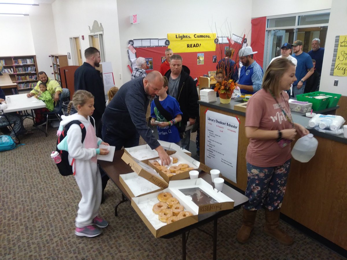 USD308's tweet photo. Morgan celebrates Doughnuts for Dad this morning. #308pride https://t.co/lECW1Hd28F