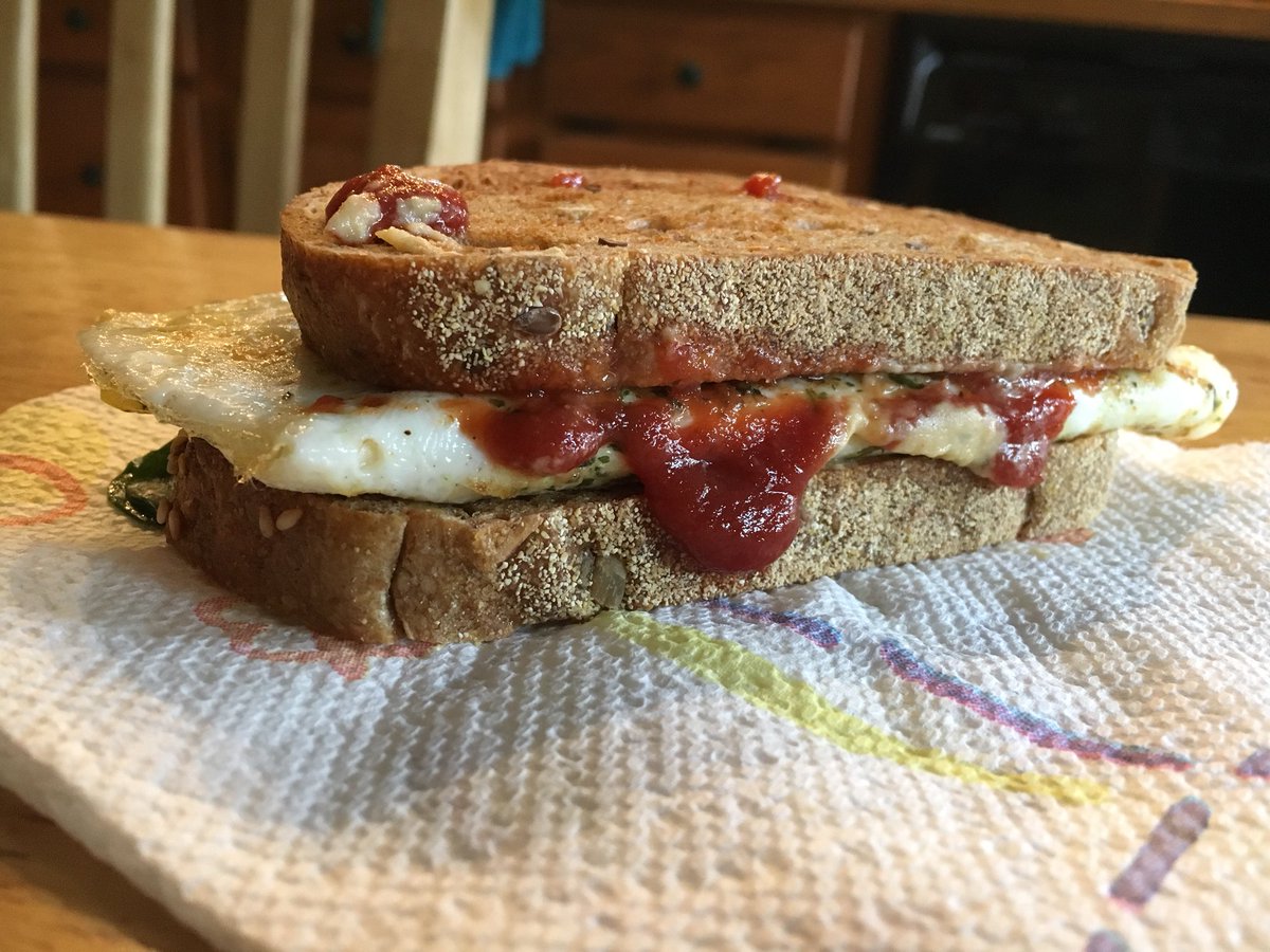upbeetRD2be's tweet photo. go to breakfast: TJ’s whole grain bread, egg, spinach, pine nut hummus and TJ’s organic ketchup 🤤 not that pretty, but delish! #FSUcan #eats https://t.co/hkVQplfHoq