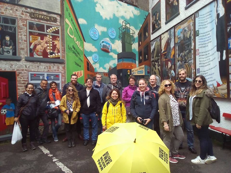BelfastFreeTour's tweet photo. Checking out the murals on the Free Walking Tour at #DukeofYorkBelfast  one of Belfast's best bars https://t.co/QYSJPxkSjC