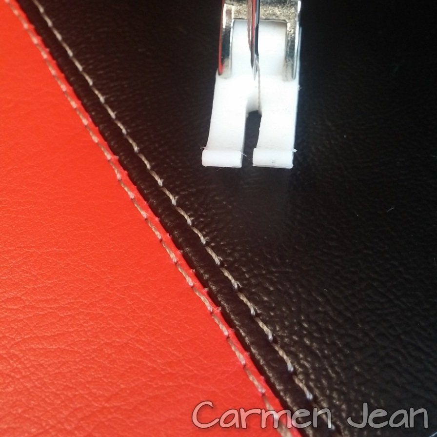 Bright red &amp; black vinyl being stitched. #Vegan friendly &amp; #handcrafted in #Dordogne.
#madeinFrance