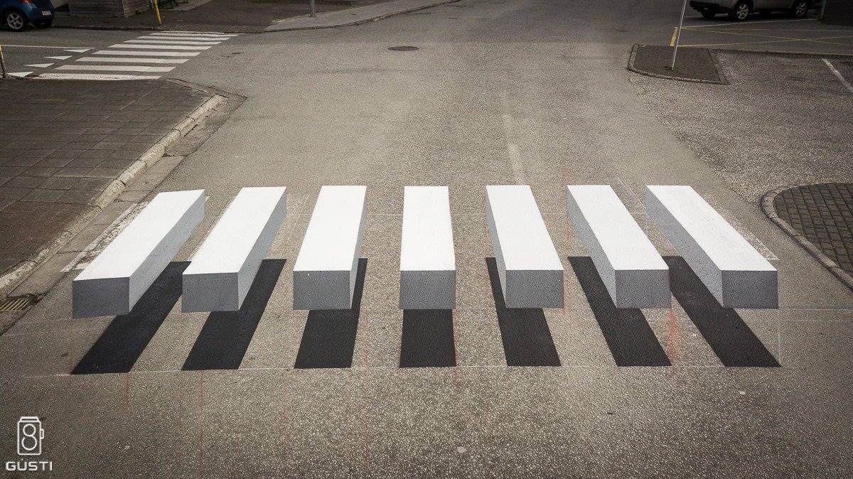 thisiscolossal's tweet photo. A 3D zebra stripe crosswalk appears in Iceland. https://t.co/u8r23WFxnl https://t.co/Y685KHGfWJ