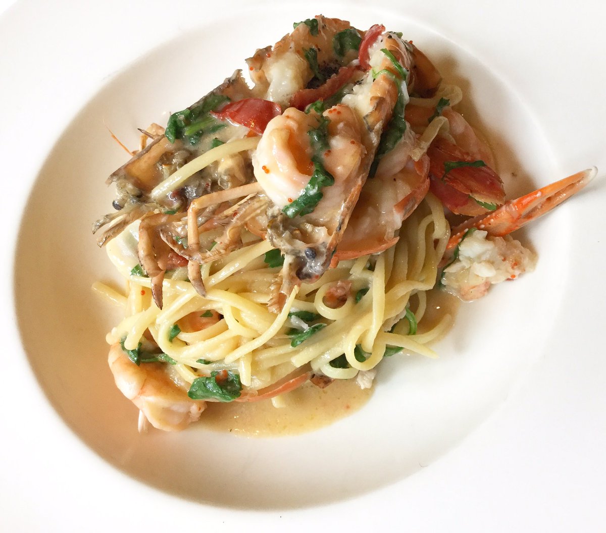 Bavette - House made flat spaghetti with an extravaganza of shrimp, cherrybomb peppers, and arugula 
#escarestaurant #pasta #yummm #eaats