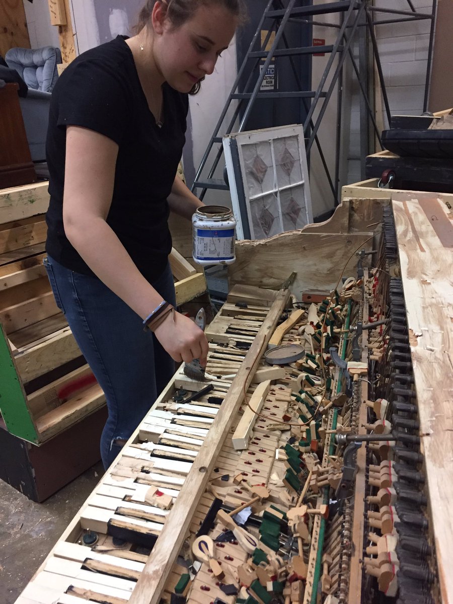 TheatreMcLean's tweet photo. Our set head is working hard to destroy this piano. She seems to be doing a good job, it looks horrible. #volumeofsmoke https://t.co/dML69AEzPy