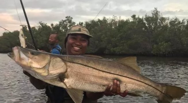 TCPalm's tweet photo. What a catch! Altansas Gordon of Fort Pierce caught and released a personal-best 40-inch snook Saturday #TCfishing https://t.co/5awGMvVEQe https://t.co/xOFzfjSX6R