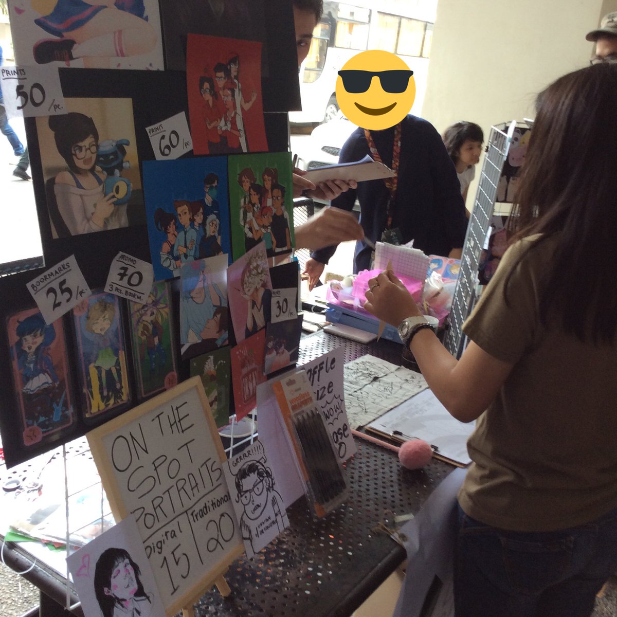 smvadesdec's tweet photo. D2's booth is up!! Stop by our booth at South Entrance, Bili na kayo D2 ng stickers, prints and on the spot portrait commisions!! https://t.co/WEU5USjKaU