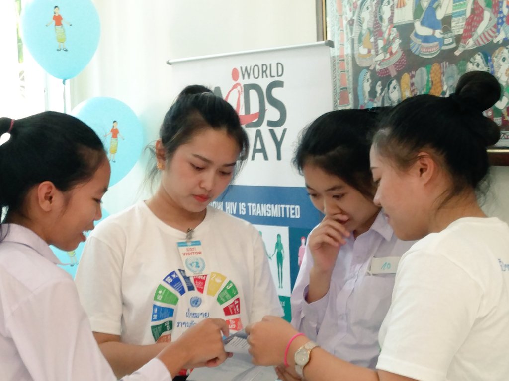 UNFPALaoPDR's tweet photo. Kids in the #OpenUNHouse for #UNDay!! In the midst of a charades game related to health and future dreams with #WHO, #UNAIDS and #UNFPA https://t.co/0wrpcnYW2S