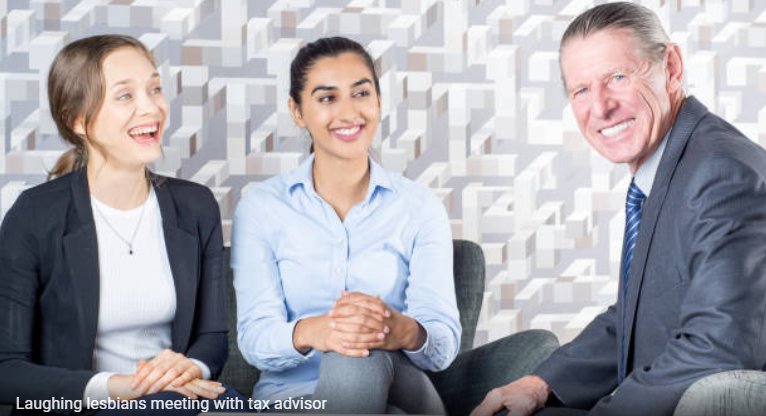rubygrennan's tweet image. looking at Getty images for photo to use in health comms poster - who named this file? "Laughing lesbians meet with tax advisor" #gettyimage