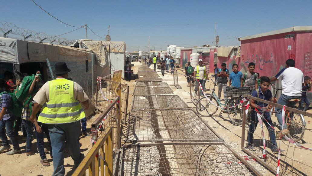 NGO_JEN_MEast's tweet photo. A huge construction to build water network is ongoing @ZaatariCamp . JEN is involved supporting the construction &amp; promoting safety. https://t.co/A8YPRZpyTy
