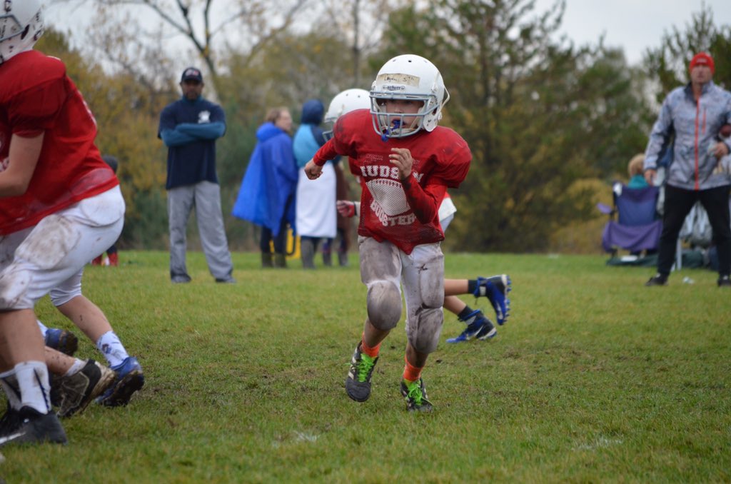Football at its finest...muddy! My boy tearing up the field!