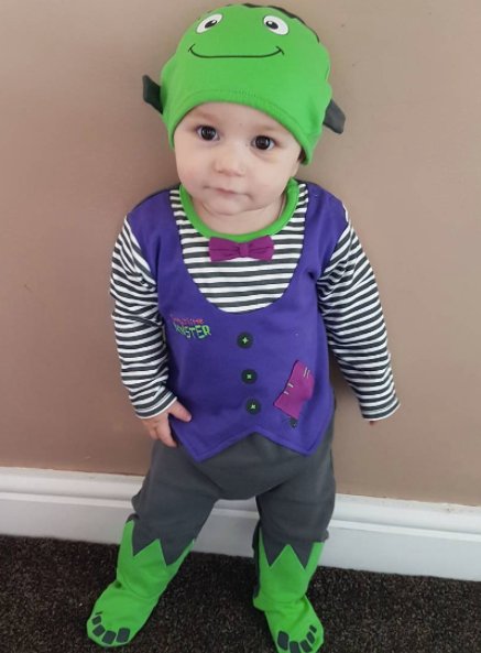 asda's tweet photo. Oliver looks adorable in our Frankenstein all-in-one! It's the perfect trick-or-treat outfit for your little ones: https://t.co/q2IRCAeMiu https://t.co/c5s5O04ZCE
