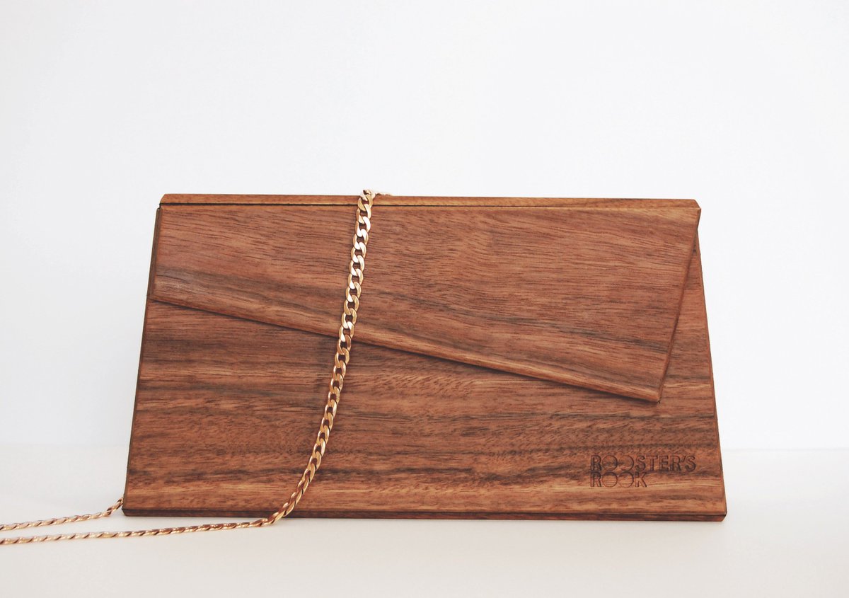 roostersrook's tweet photo. You'd be forgiven for thinking that timber in fashion don't mix - But we're doing just that by fusing Australian timber into statement #bags. Head to https://t.co/WaKVIklGh8 for that unique races accessories. #roostersrook #style #woodenbag #springfashion #MelbourneCup #fashion https://t.co/nMyaZn6zJj